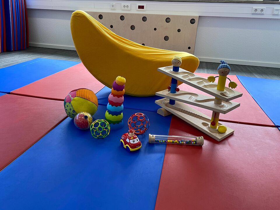 Murmelbahn und Spielzeug